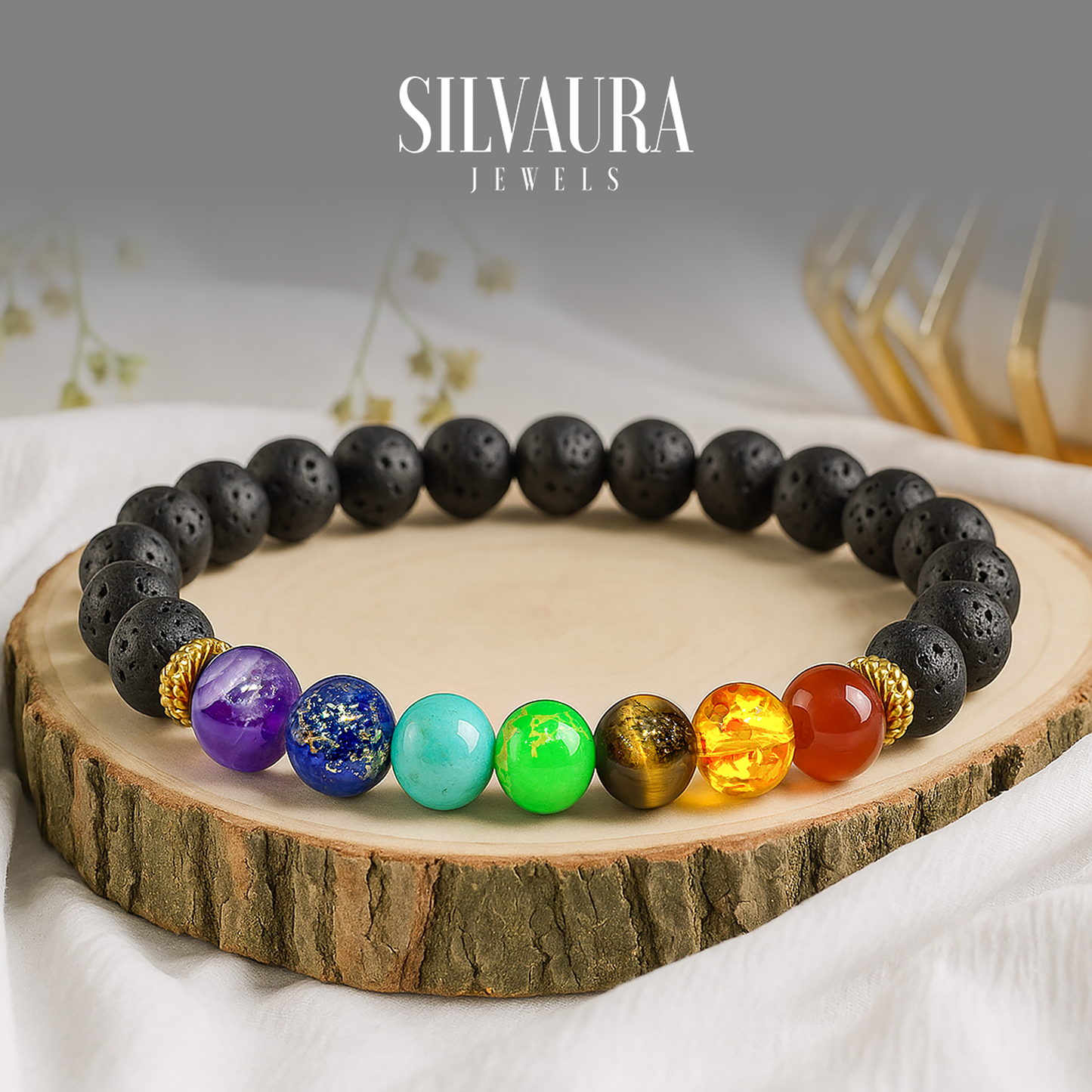 SILVAURA JEWELS 7 chakra bracelet with colorful semi precious stones and black lava beads