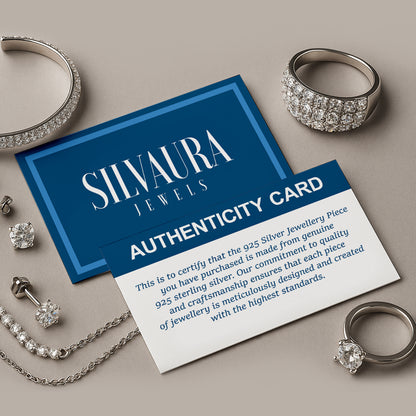 SILVAURA JEWELS authenticity card with assorted sterling jewelry and sterling silver lightning bolt hoop earrings